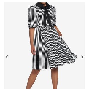 Her Universe. Never worn.Tags on. Size small. Black+white striped dress.